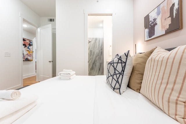 bedroom featuring hardwood / wood-style flooring