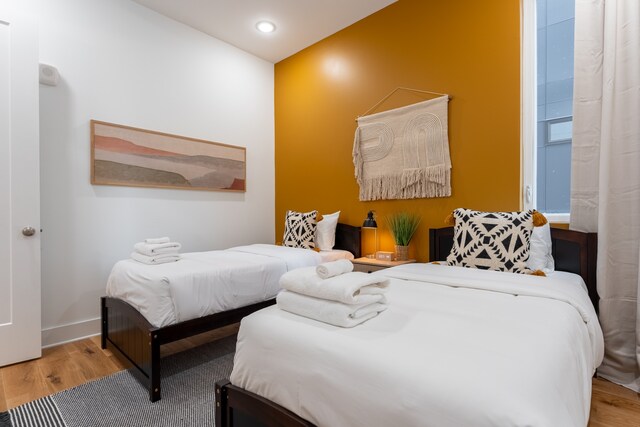 bedroom with light wood-type flooring