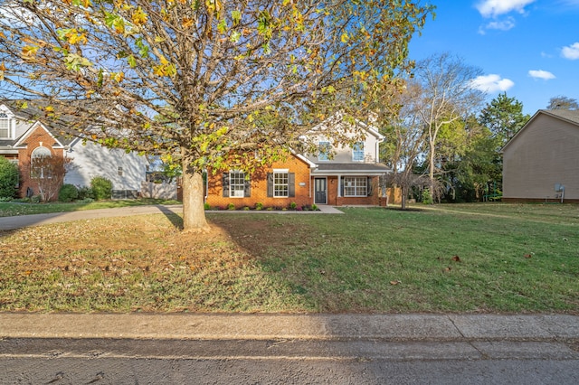 view of front of home featuring a front yard