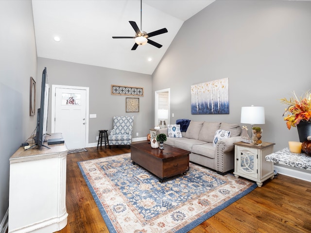 living room with high vaulted ceiling, dark hardwood / wood-style floors, and ceiling fan