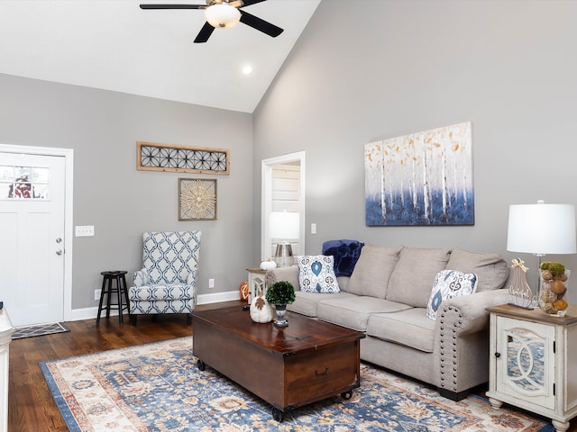 living room featuring hardwood / wood-style floors, ceiling fan, and high vaulted ceiling