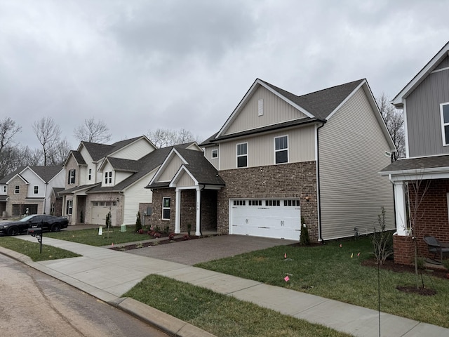 view of front facade featuring a garage and a front lawn