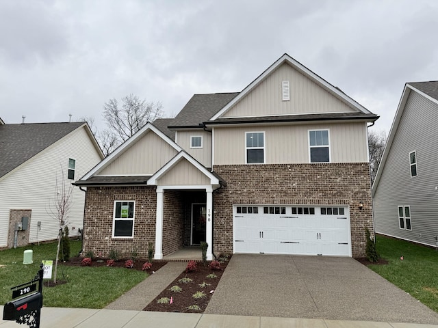 view of front facade with a garage and a front lawn