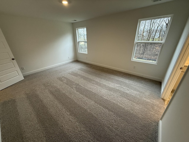 unfurnished bedroom featuring carpet