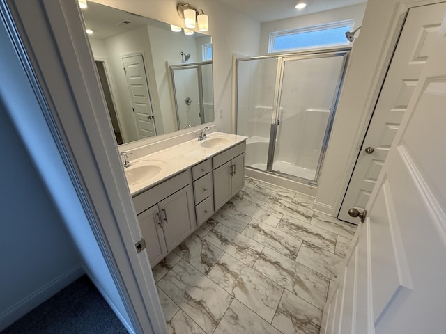 bathroom with vanity and walk in shower