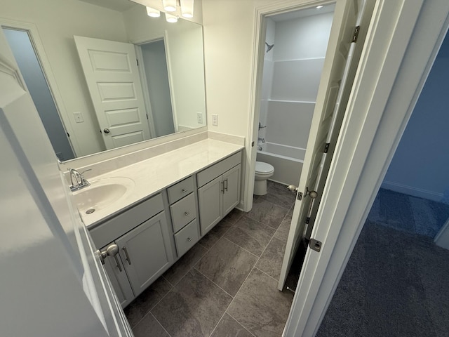 full bathroom featuring toilet, vanity, and bathtub / shower combination