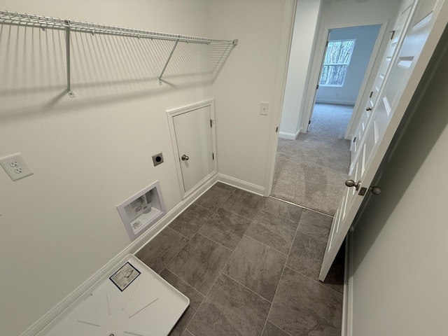 clothes washing area with dark carpet and electric dryer hookup