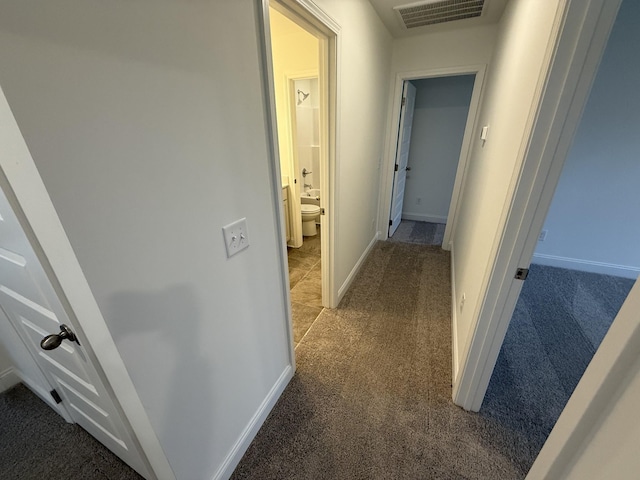 hallway with carpet