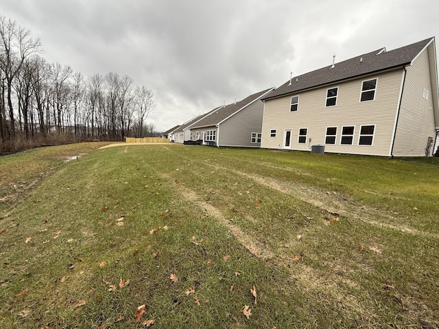 view of yard with central AC unit