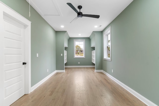 unfurnished room featuring ceiling fan and light hardwood / wood-style flooring