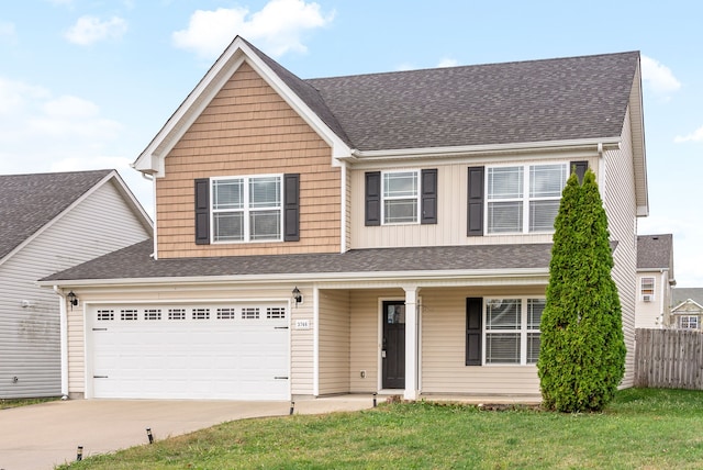 view of front facade featuring a garage and a front lawn