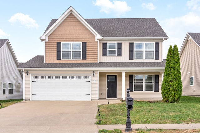 view of front facade with a front lawn and a garage