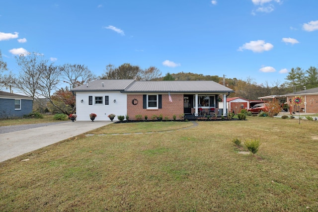 single story home with a front lawn and a porch