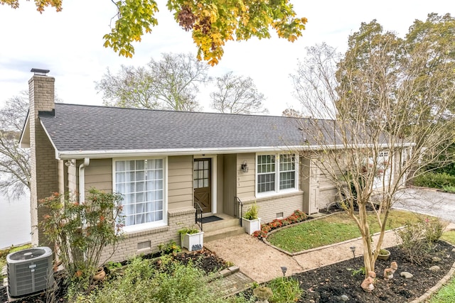 single story home with central air condition unit