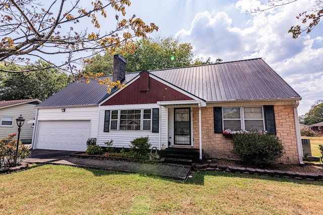 single story home featuring a garage and a front yard