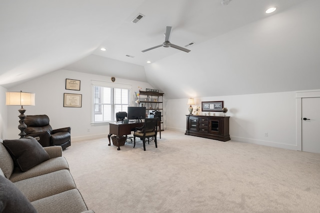 office featuring light colored carpet, ceiling fan, and vaulted ceiling