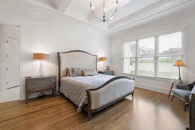 bedroom featuring hardwood / wood-style flooring, beam ceiling, crown molding, and a notable chandelier