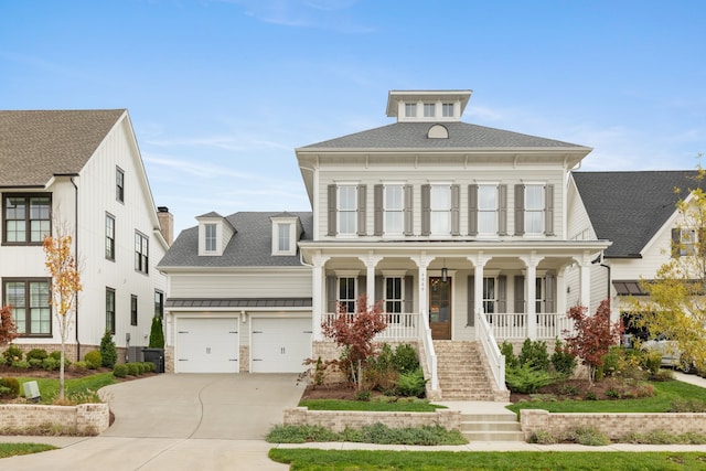 view of front of house featuring a garage and covered porch