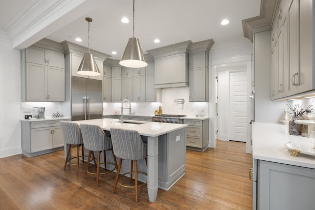 kitchen featuring gray cabinets and sink