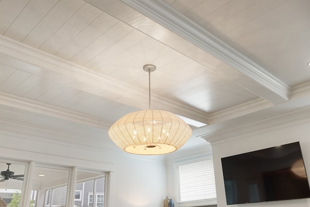 interior details with ceiling fan, beam ceiling, and crown molding