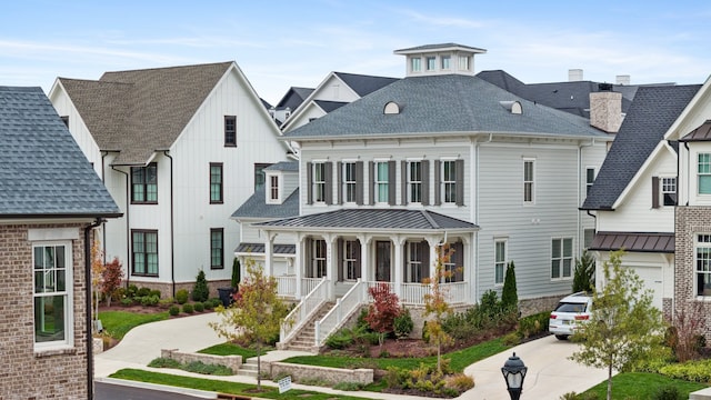 view of front of house featuring a garage and covered porch