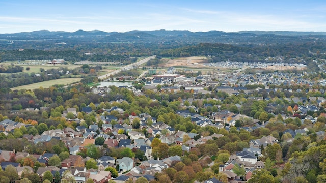 drone / aerial view featuring a mountain view