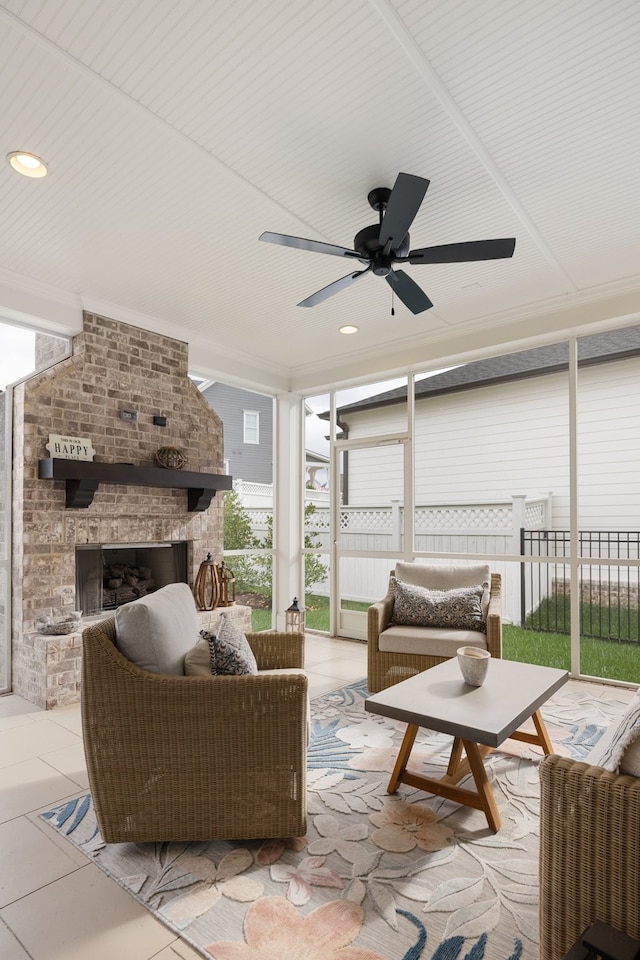 view of patio featuring an outdoor living space with a fireplace and ceiling fan