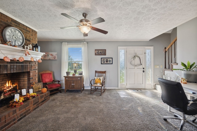 home office featuring a fireplace, ceiling fan, a textured ceiling, and carpet floors