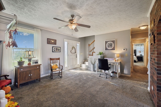 carpeted home office with a textured ceiling and ceiling fan