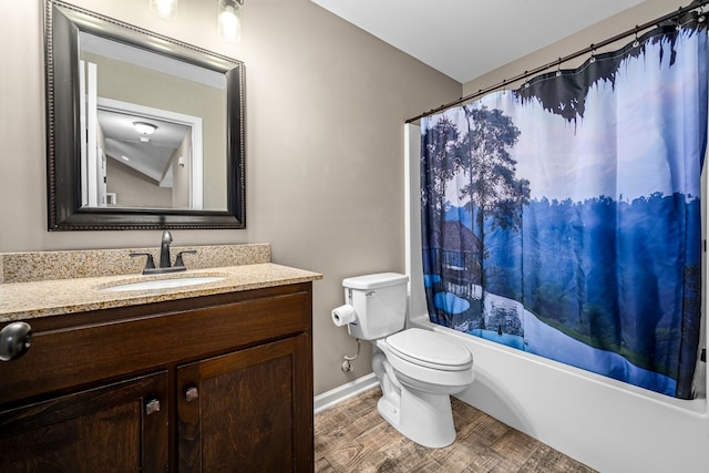 full bathroom with hardwood / wood-style floors, shower / tub combo with curtain, vanity, and toilet