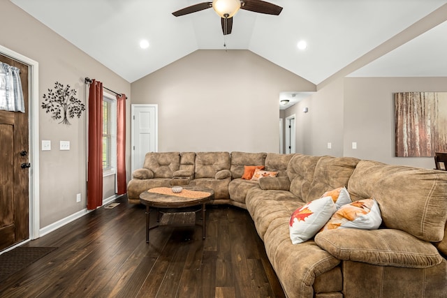 living room featuring ceiling fan, dark hardwood / wood-style floors, and vaulted ceiling