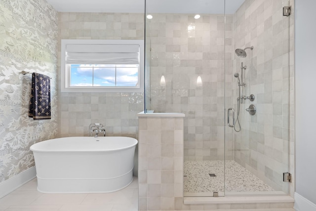5124 Bond Mill Rd, Thompsons Station, TN 37179 - bathroom featuring a stall shower, a freestanding tub, and baseboards