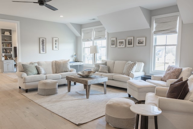 living area with visible vents, recessed lighting, a ceiling fan, and light wood-style floors