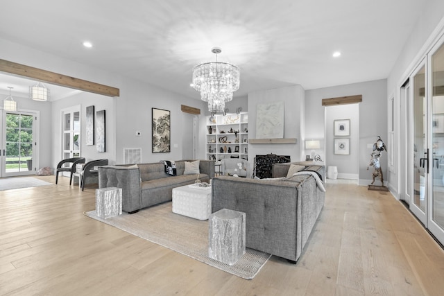 5124 Bond Mill Rd, Thompsons Station, TN 37179 - living room with light wood finished floors, recessed lighting, a chandelier, a fireplace, and baseboards