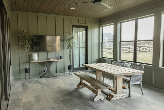 sunroom featuring wood ceiling