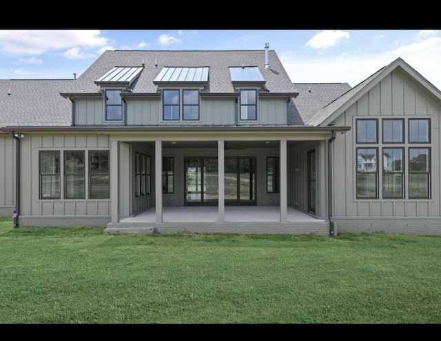 5124 Bond Mill Rd, Thompsons Station, TN 37179 - rear view of property featuring a patio area, a lawn, board and batten siding, and a shingled roof