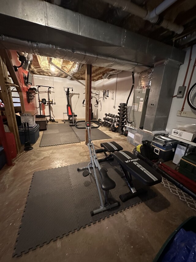 exercise room with concrete floors