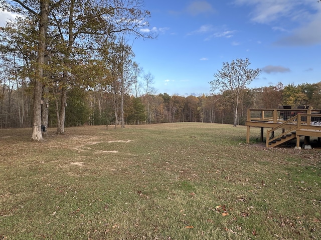 view of yard featuring a deck