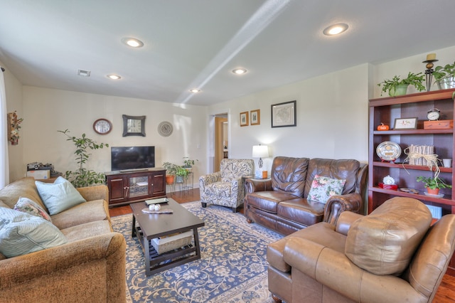 living room with hardwood / wood-style flooring