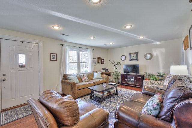 living room with wood-type flooring