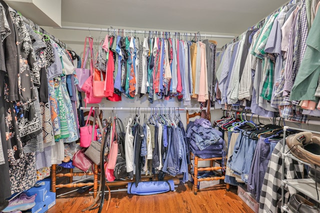 walk in closet featuring hardwood / wood-style floors