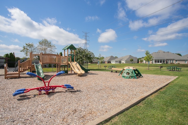 view of playground with a yard