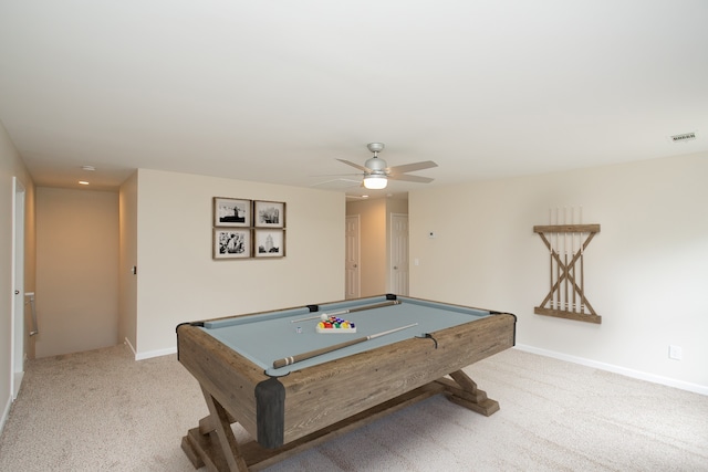 game room with pool table, light colored carpet, and ceiling fan