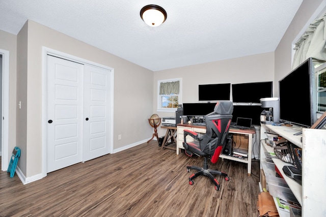 office area with a textured ceiling and hardwood / wood-style flooring