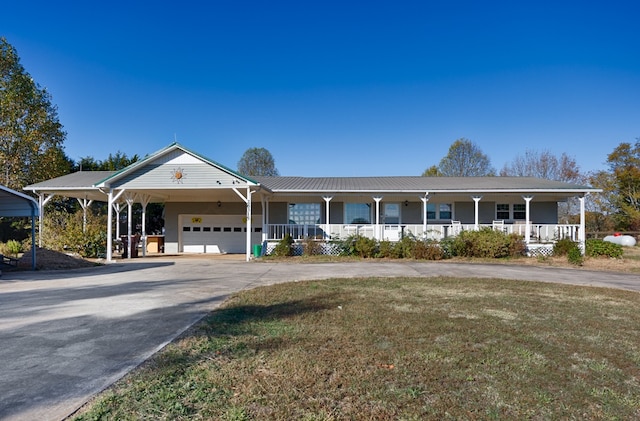 ranch-style house with a porch, a carport, a front lawn, and a garage