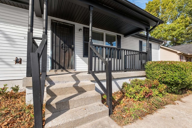 property entrance with a porch