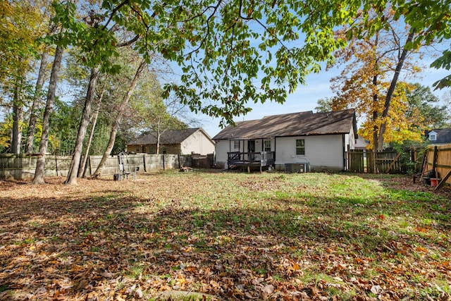 view of yard featuring a wooden deck