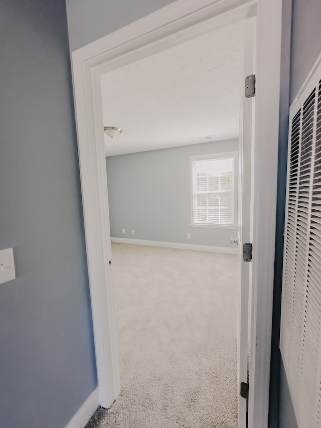 corridor with carpet