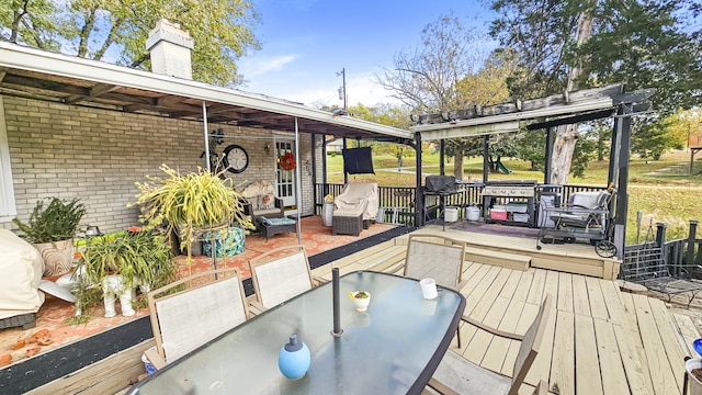 wooden deck with an outdoor hangout area