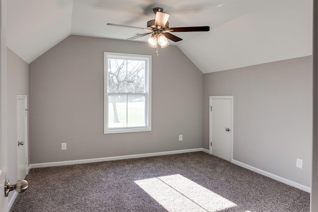 additional living space with vaulted ceiling, ceiling fan, and carpet floors